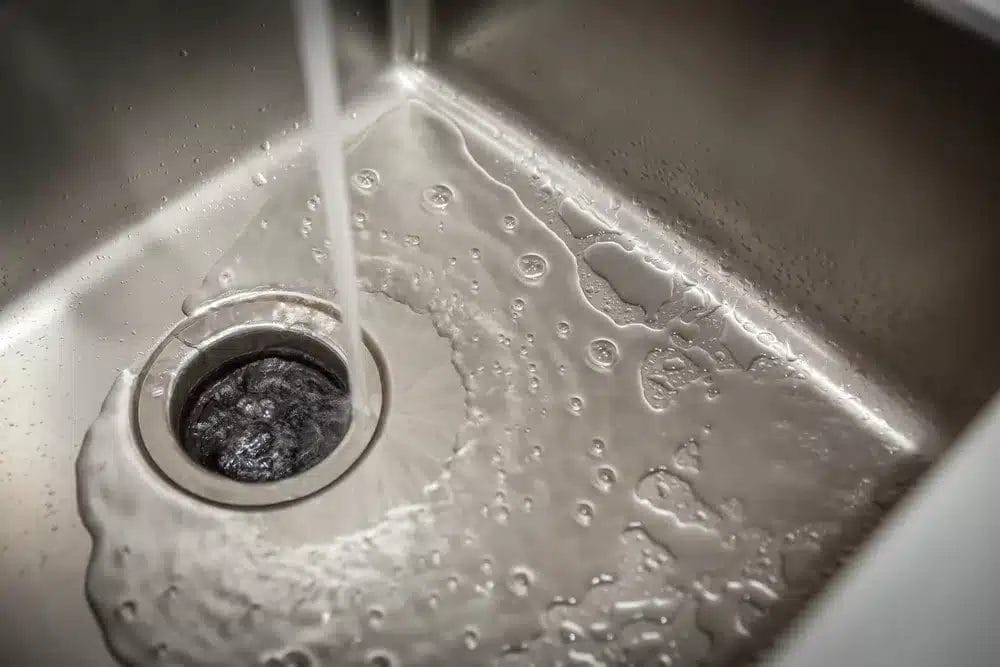 How does a garbage disposal work?